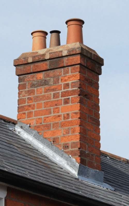 Chimney repair on a roof